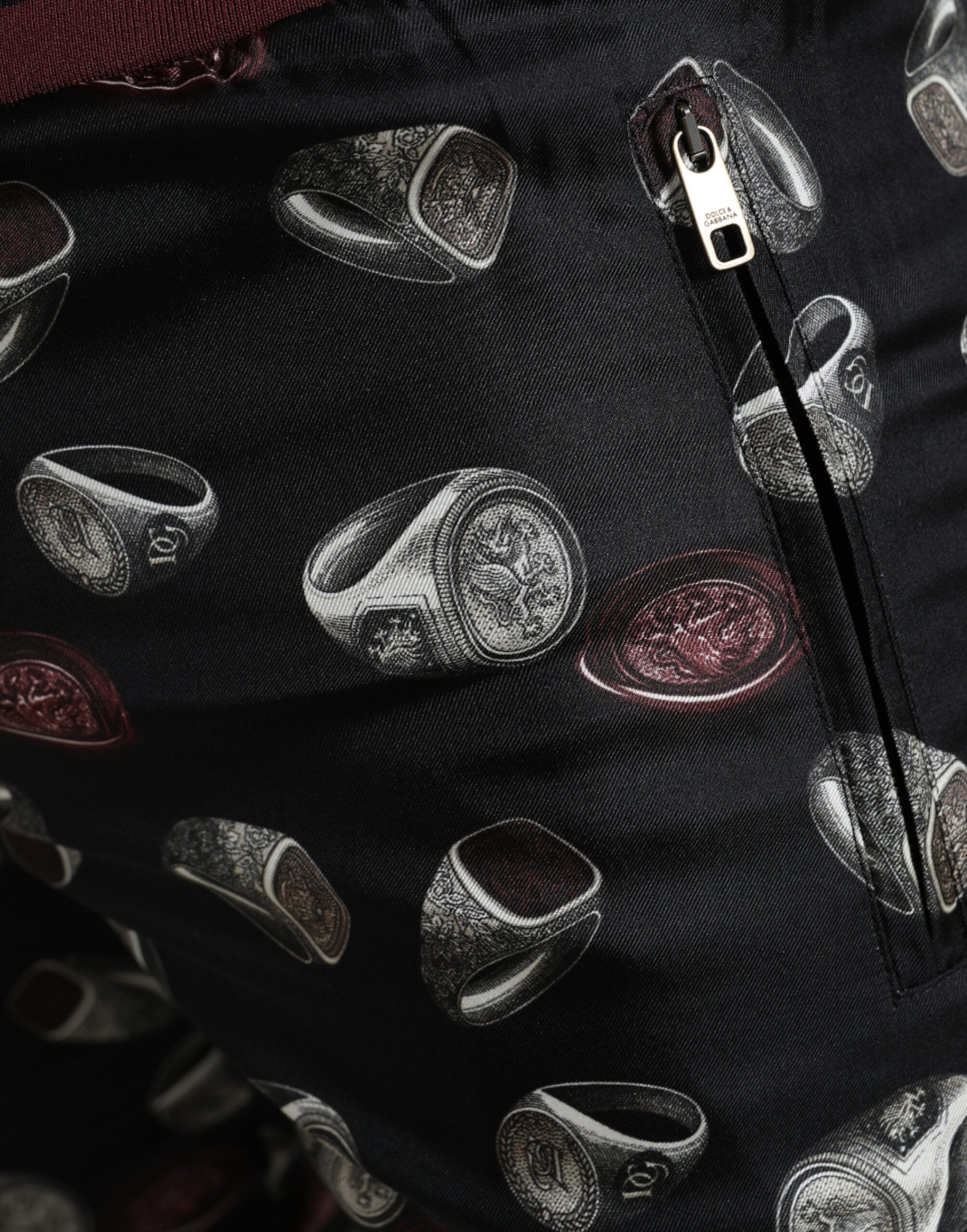 Dolce &amp; Gabbana Edle Jogginghose aus Seide mit Ring-Print