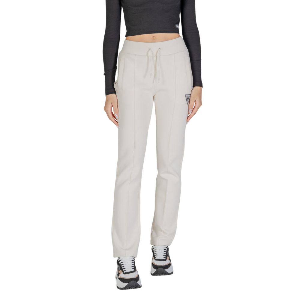 Blugi și pantaloni Guess Active din bumbac crem