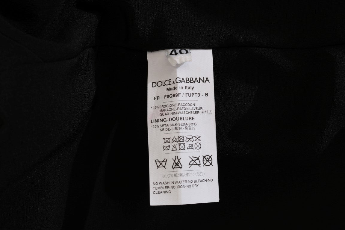 Dolce &amp; Gabbana Eleganter knielanger Mantel aus braunem Waschbärpelz