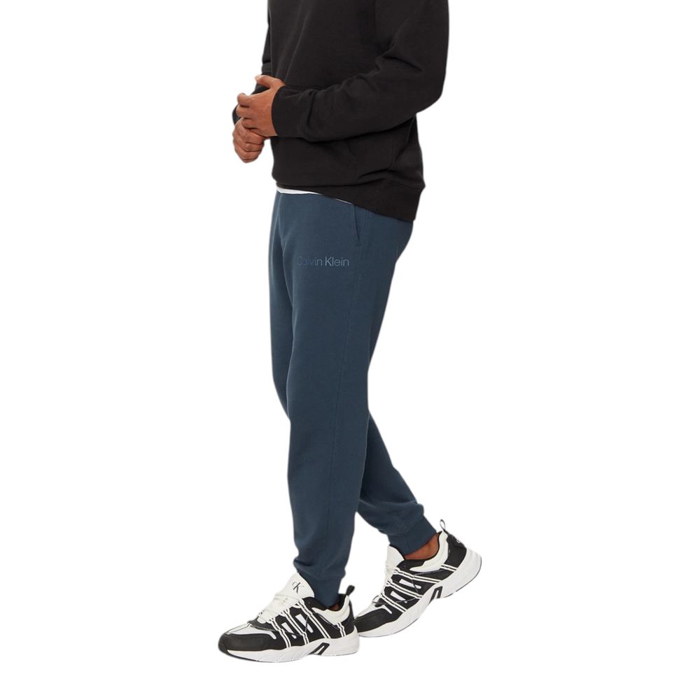 Pantaloni sport Calvin Klein Jeans albaștri din bumbac
