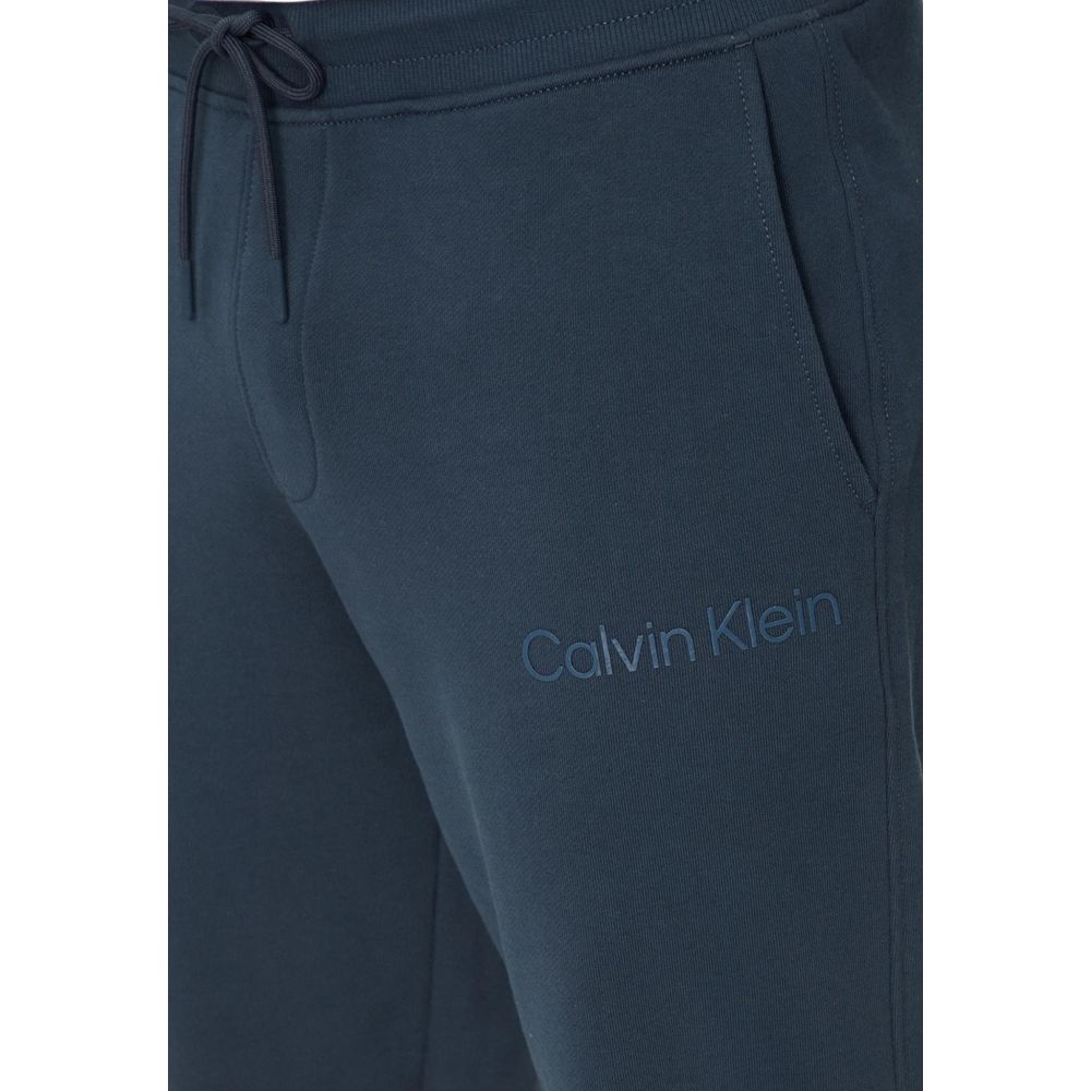 Pantaloni sport Calvin Klein Jeans albaștri din bumbac