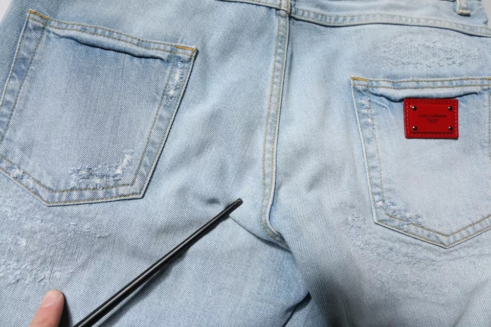 Dolce &amp; Gabbana – Hellblaue, zerfetzte Skinny-Jeans mit Logo