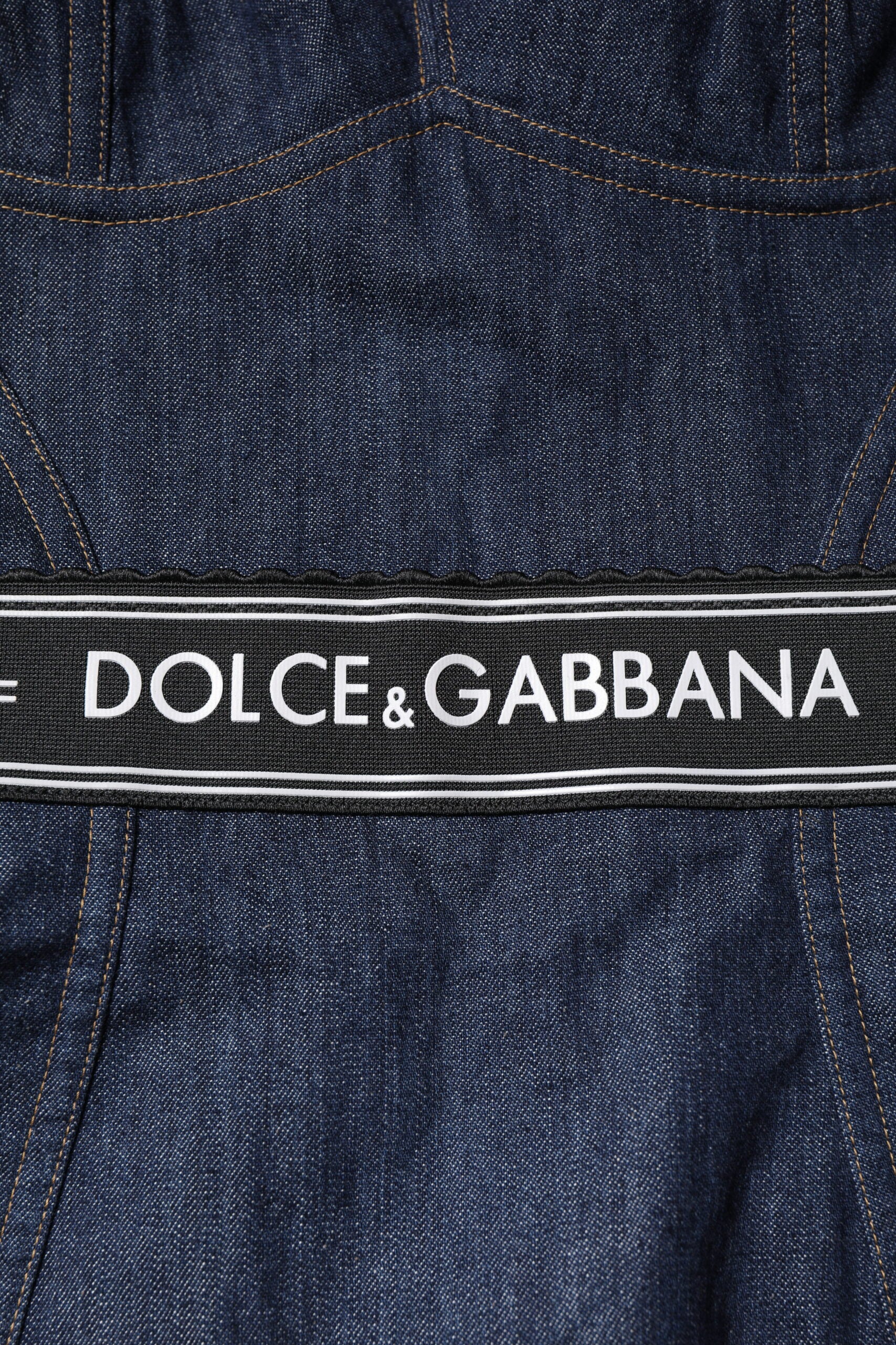 Dolce &amp; Gabbana – Ärmelloser, figurbetonter Denim-Body aus Baumwollstretch in Blau