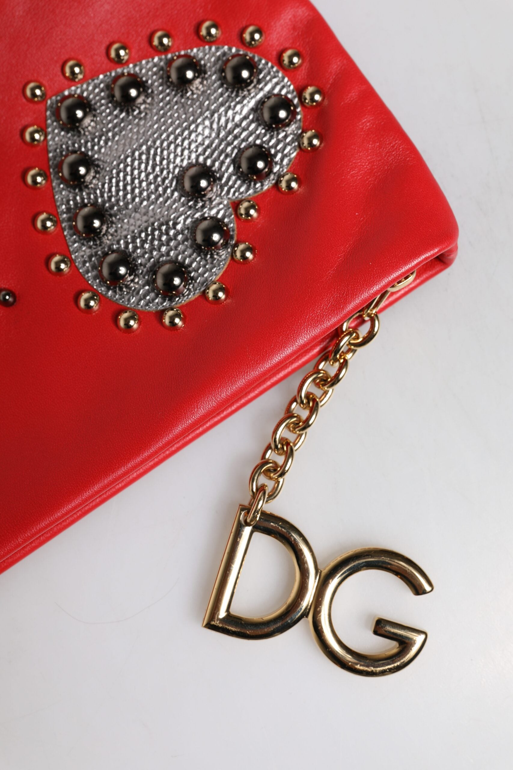 Dolce &amp; Gabbana – Rote Clutch aus verziertem Leder „Revolutions“