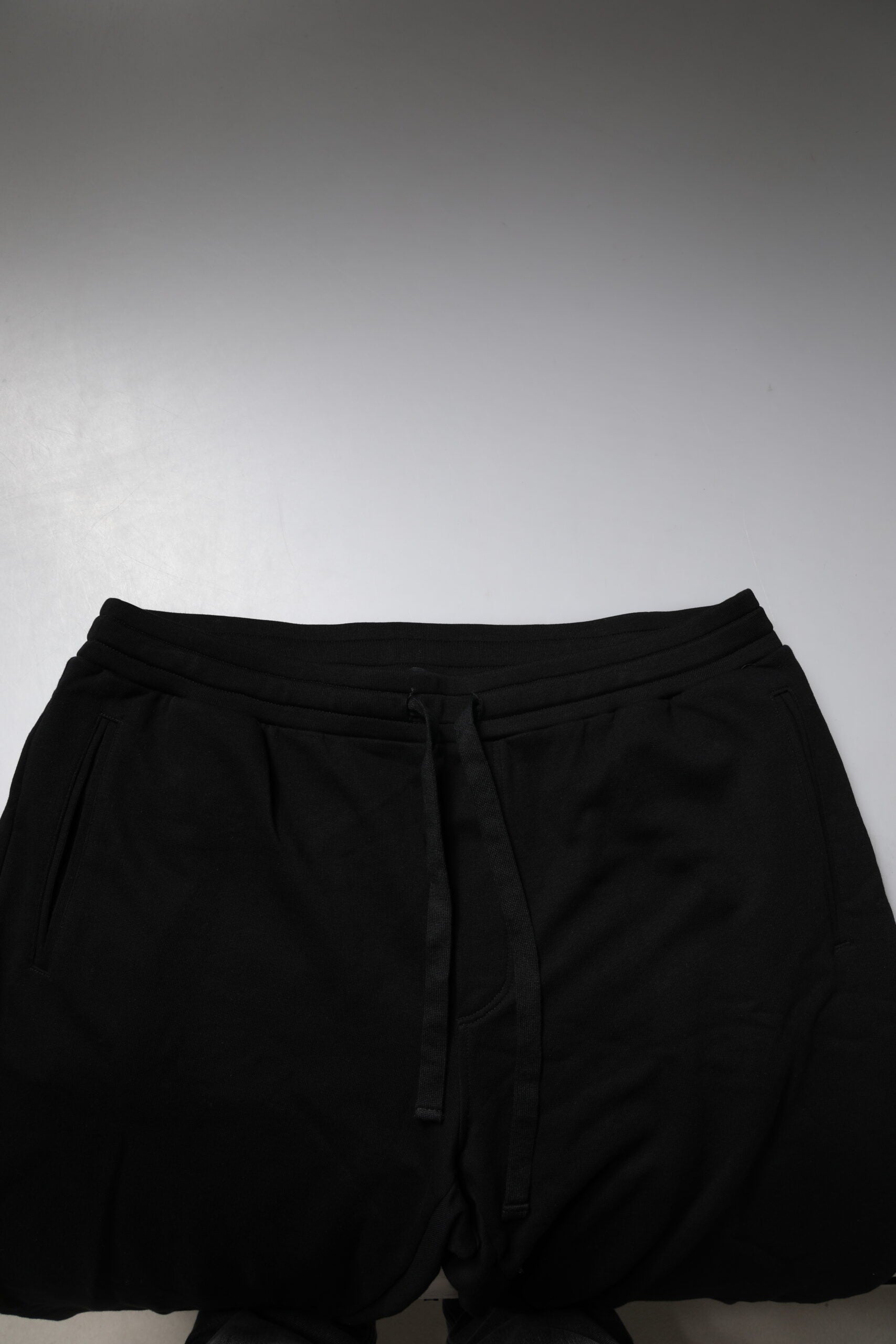 Pantaloni jogger Dolce &amp; Gabbana negri din bumbac cu logo coroană