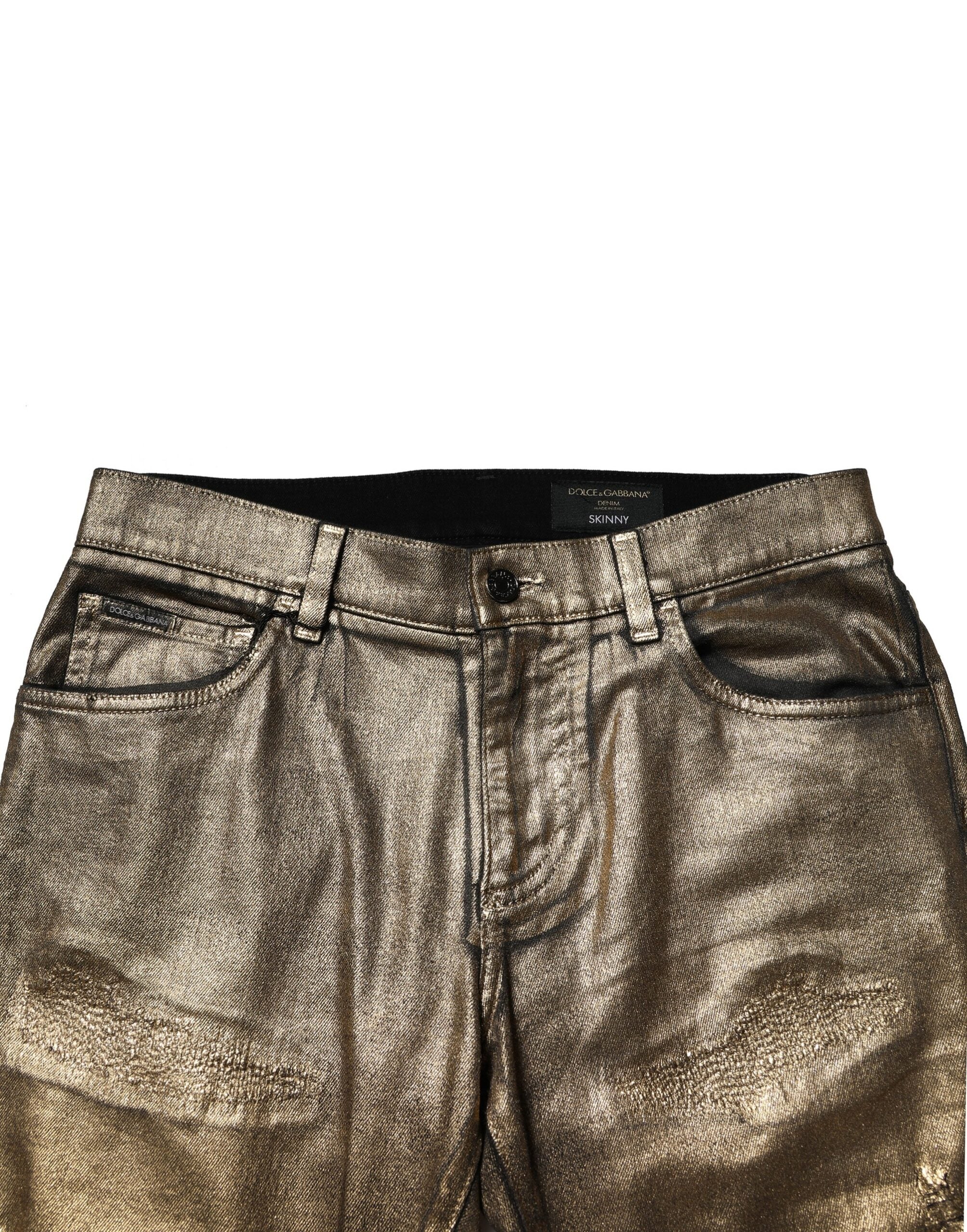 Blugi Dolce &amp; Gabbana din denim slim elastic, cu imprimeu auriu și imprimeu zdrențuit