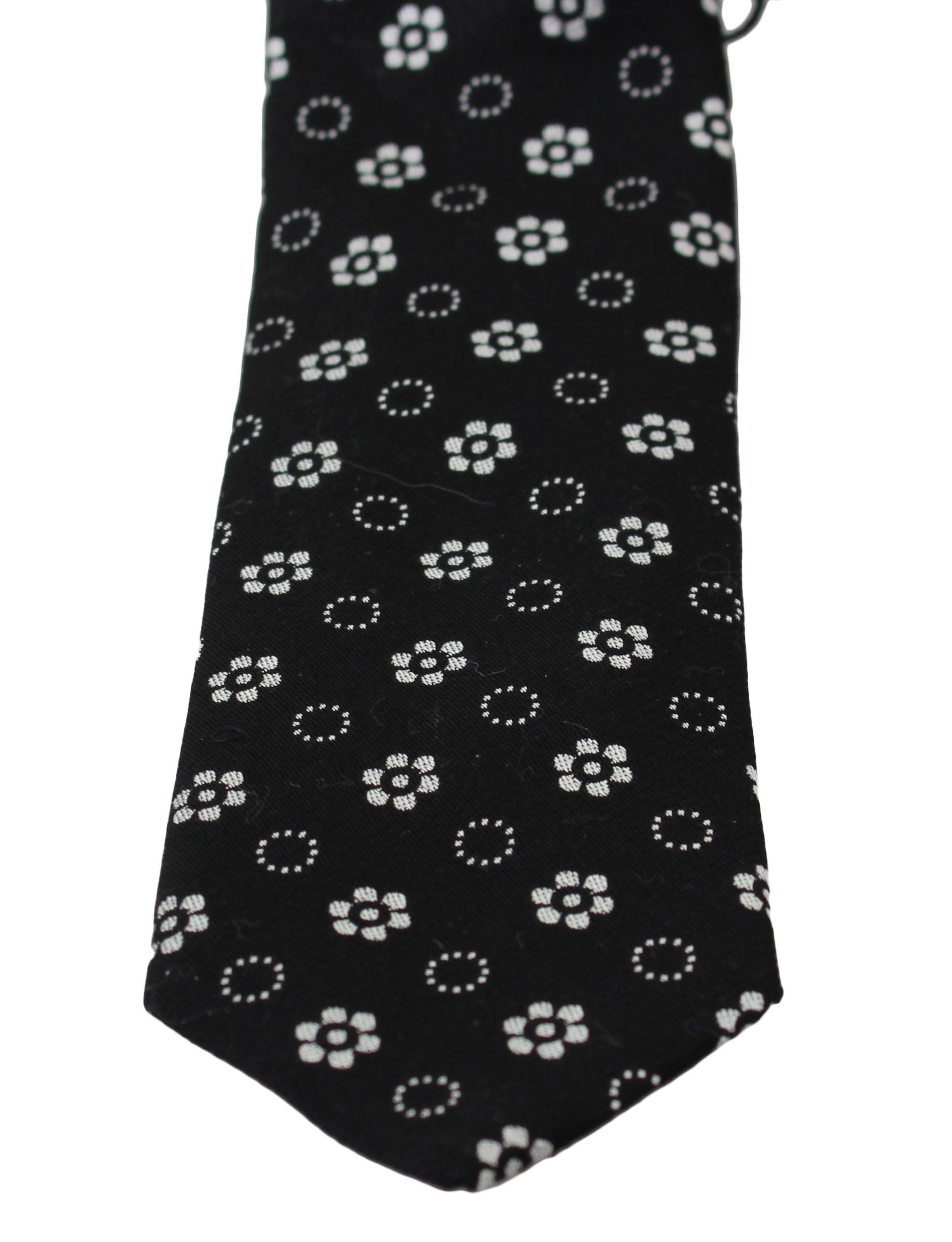 Dolce &amp; Gabbana Elegante schwarze Seidenkrawatte mit Blumenmuster